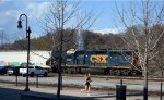 A jogger, CSX local L206, and the Langley Fountain line up for this shot.